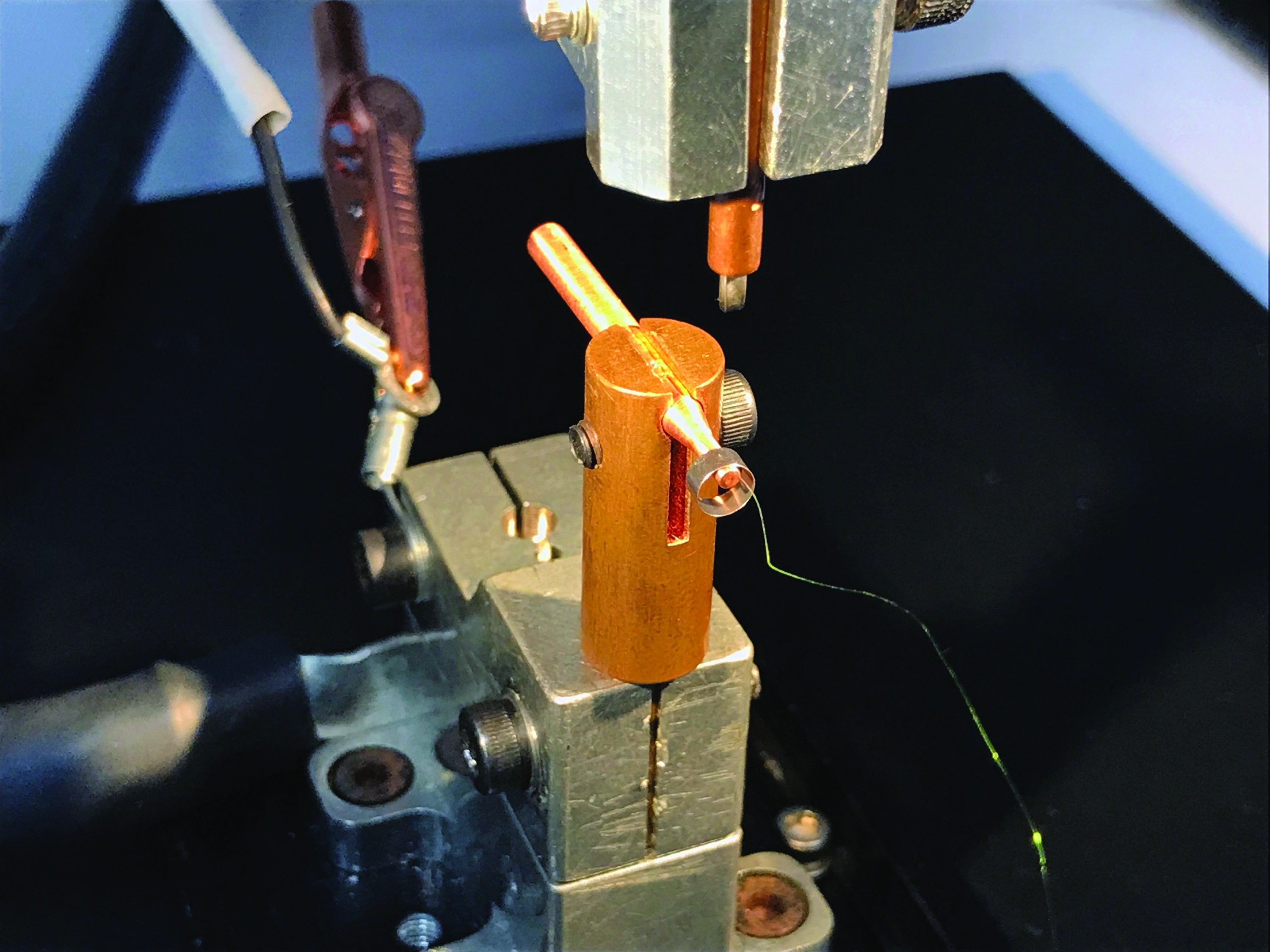 WJ July 2026 - Where Resistance Welding Meets Medicine - Figure 5 - AWT Inc Image - Platinum Ring Copper Wire Welding Setup.webp