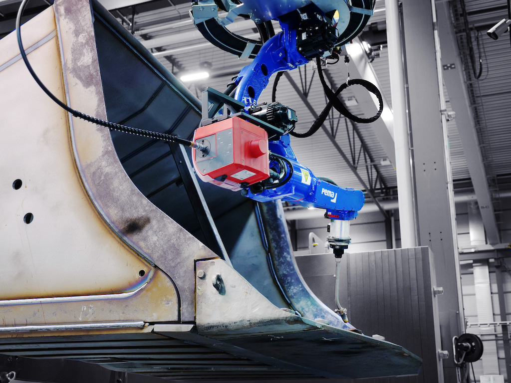 WD Dec 23 - Automated Solutions for Bucket Welding Help Keep Manufacturers and the Earth Moving - Photo 2