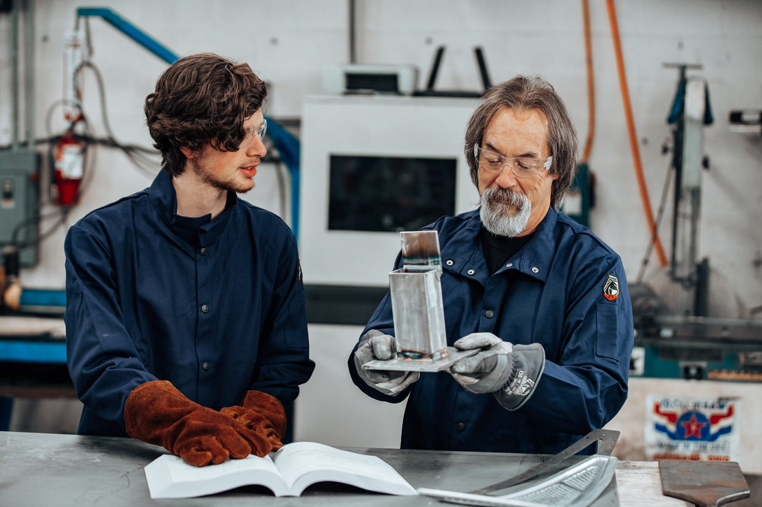 Instructor inspecting weld 2.jpg