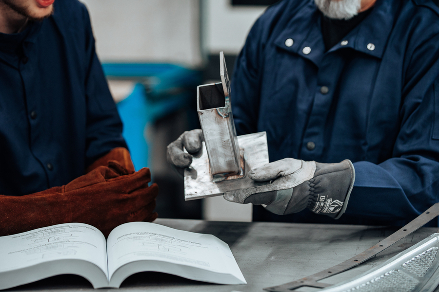 Instructor inspecting weld 3.jpg